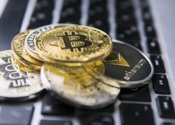 Bitcoin Falls to Half Its Peak as Investors Shun Risk