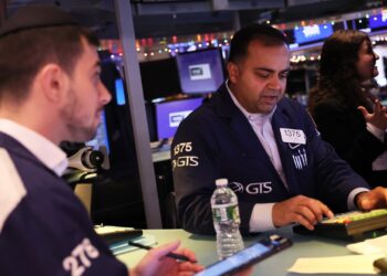 Nasdaq notches second day of gains as investors buy beaten-up tech shares like Tesla