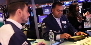 Nasdaq notches second day of gains as investors buy beaten-up tech shares like Tesla